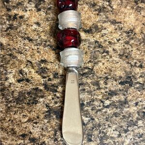 The Pampered Chef Red and Silver Spread Knife